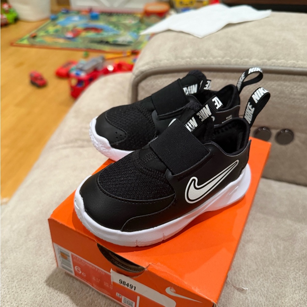 Nike Kids Black and White Slip-On Sneakers